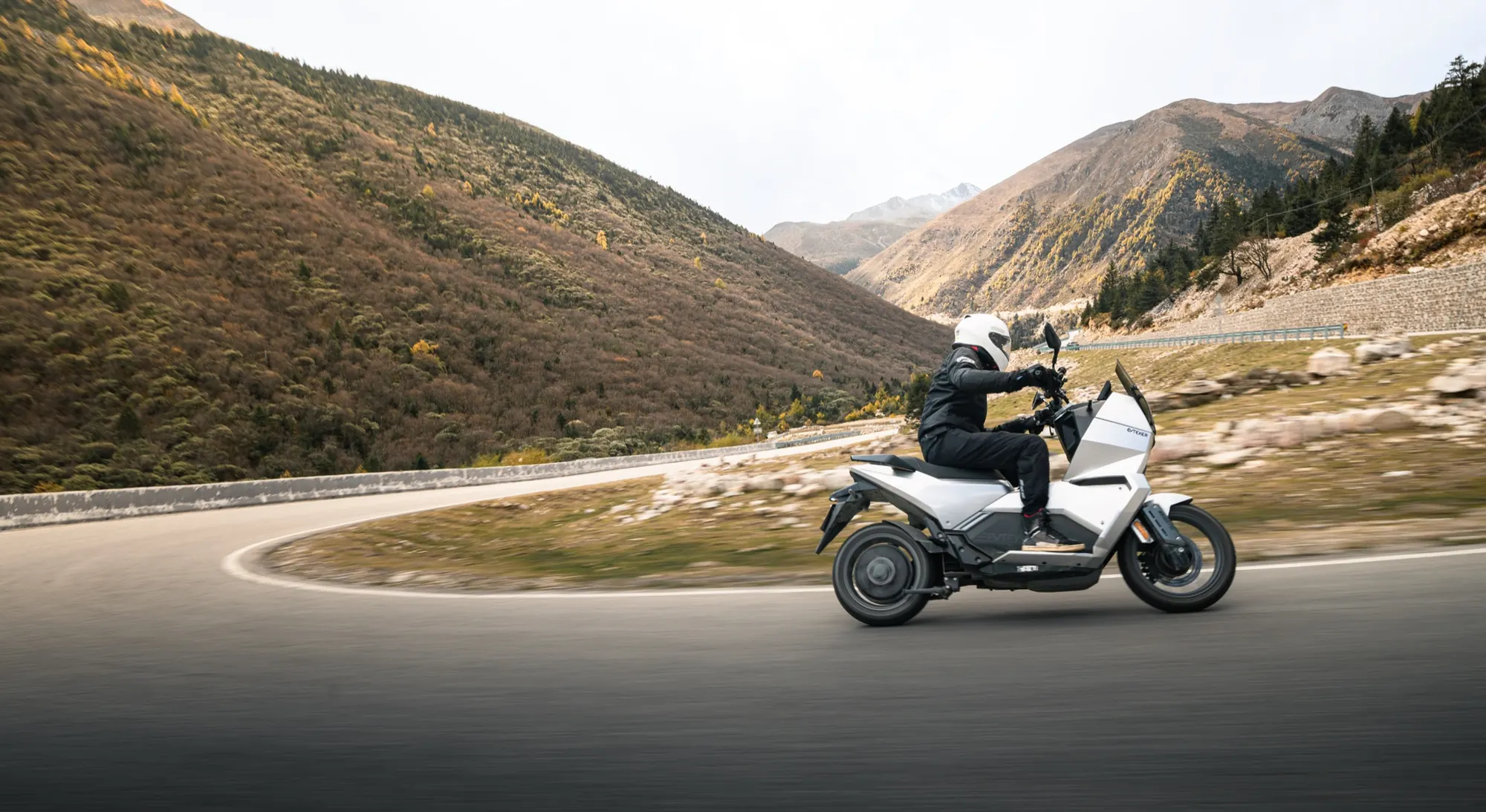 EVREV mountain road riding scene