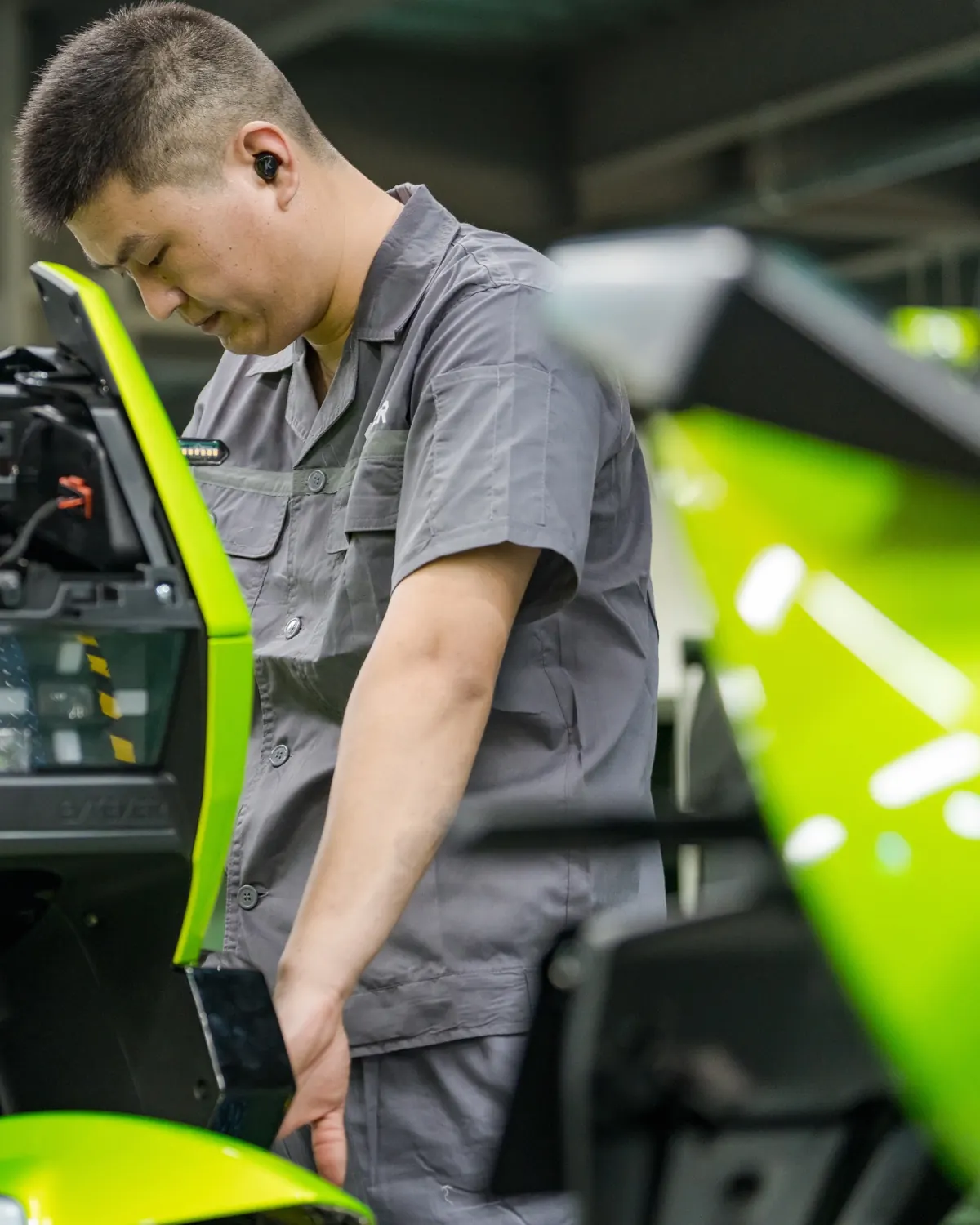 Technician assembling an EVREV electric motorcycle